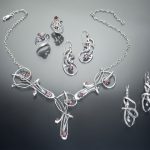 Silver jewelry set with garnet by Jacques Hemsi of Jewelry of Chardavogne